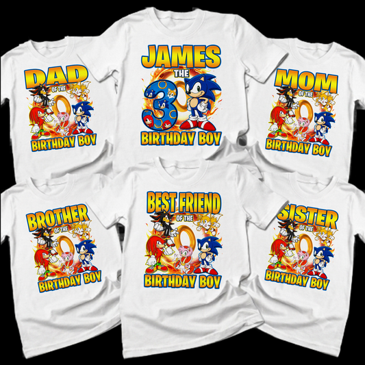 Six white t-shirts arranged in two rows on a black background, each printed with a colorful birthday graphic featuring Sonic the Hedgehog characters and text such as 'Dad's Birthday Boy,' 'James the 3rd Birthday Boy,' 'Mom's Birthday Boy,' 'Brother's Birthday Boy,' 'Best Friend of the Birthday Boy,' and 'Sister's Birthday Boy.'.